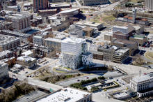 Aerial view from the Northeast showing the building's urban context. - Photo Credit: Construction Trades Services, Inc / Theresa Tomasini